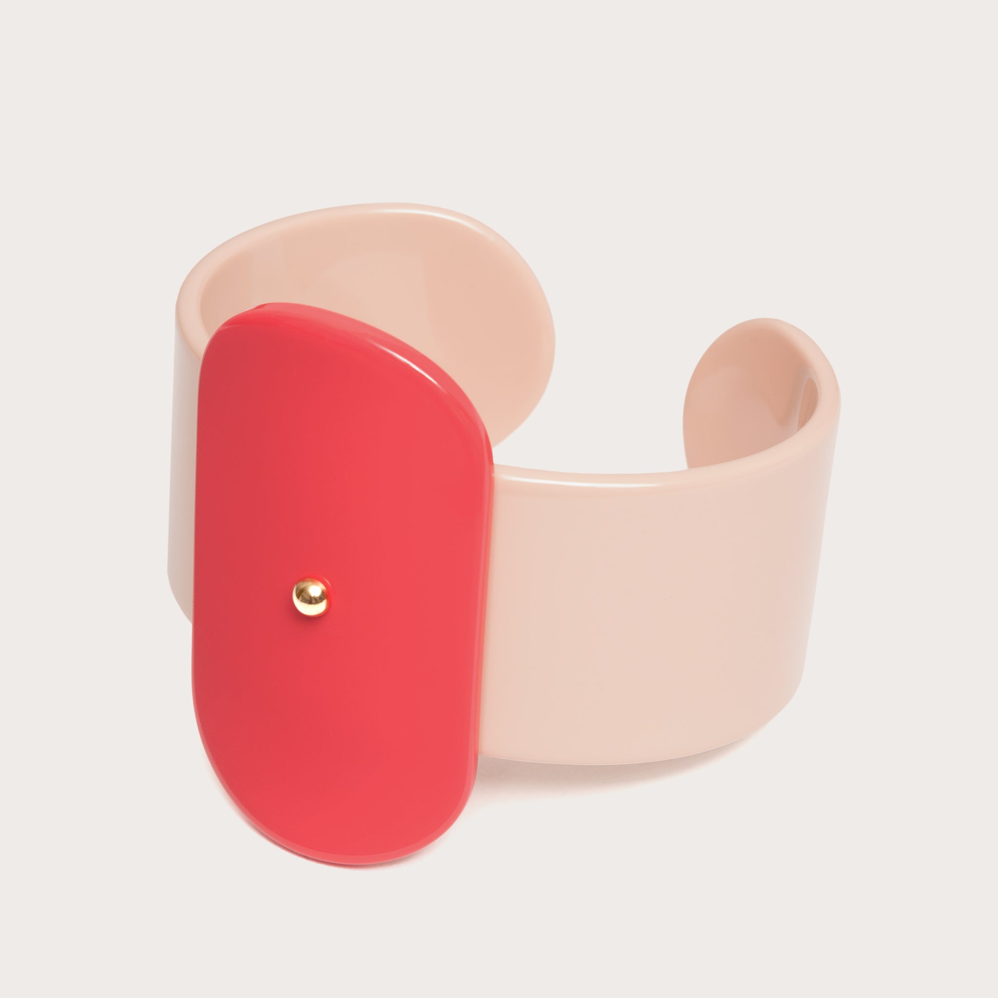 Vue de côté de la manchette Jazzic en corail et rose poudré