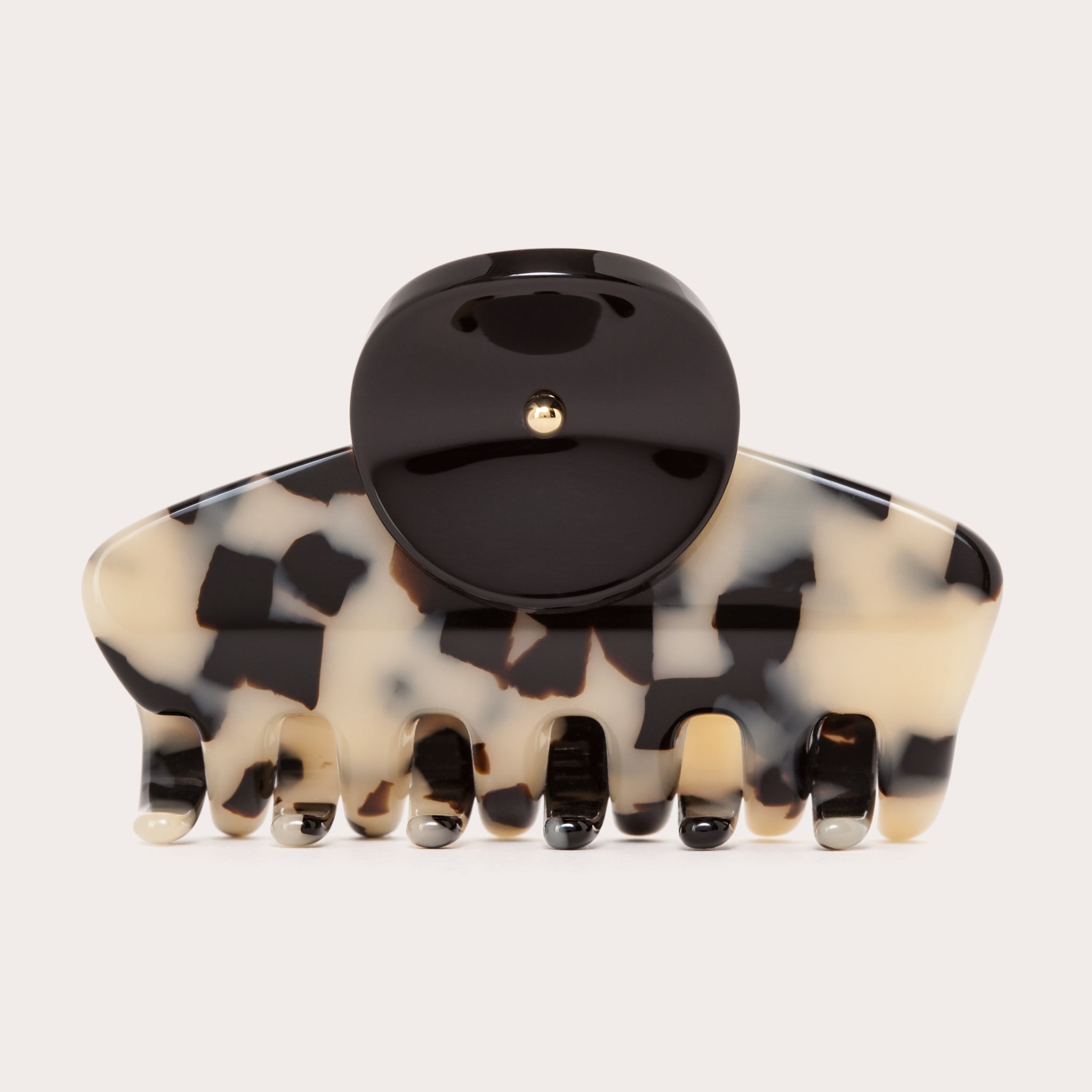 Petite pince à cheveux noire et écailles vue de face Rosematic